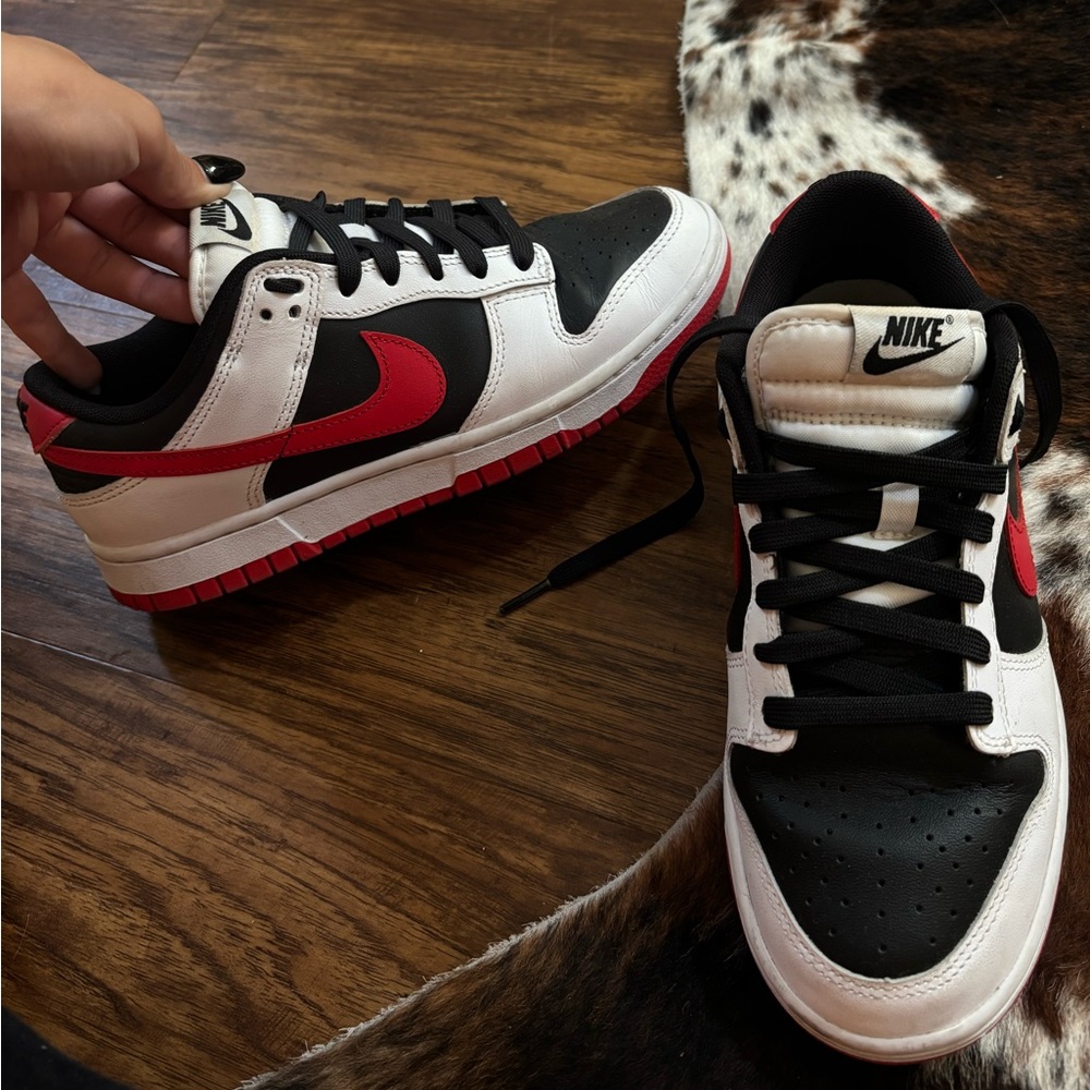 Women’s nike dunk size 7.5 red, white, and black.